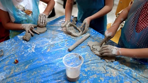 Children Working with Clay in Art Class