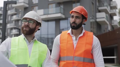 The Builder and Architect Man Are Discussing the Construction Plan of the Modern Business Center