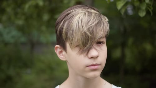 Teen Portrait with Blond Streaked Hair Outdoors