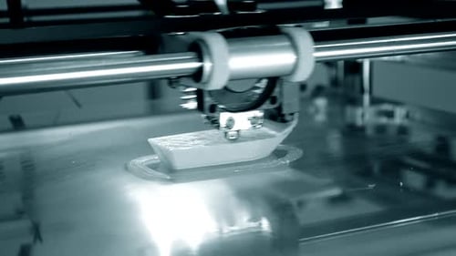 Close Up of 3D Printer Creating Object