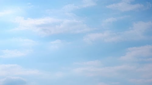 Clouds Drifting Across the Blue Sky