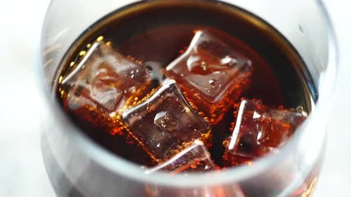Dark Soda and Ice Close Up