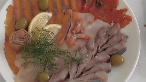Table is Served with Red Fish and Meat