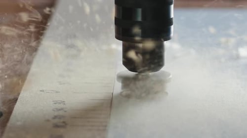 Drilling Wide Hole in the Chipboard