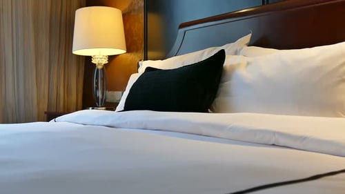 Elegant Hotel Room Bed with White Linens