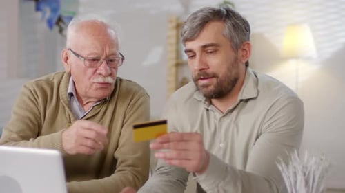 Son Teaching Father to Shop Online