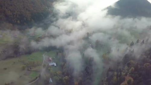 Aerial View of Foggy Morning in Autumn Rural Country at Sunrise