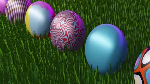 Colorful Decorative Easter Eggs Rolling Through Green Grass