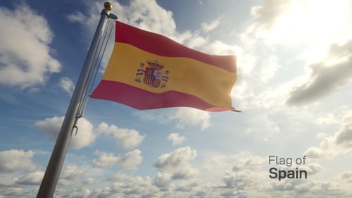 Waving Flag of Spain Against a Sunny Sky