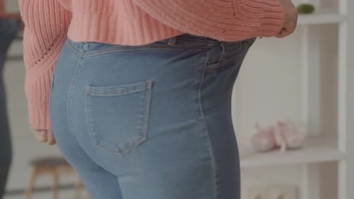 Pretty Woman on Diet Showing Weightloss Success