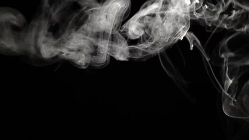Cigarette Fume in Against Black Background