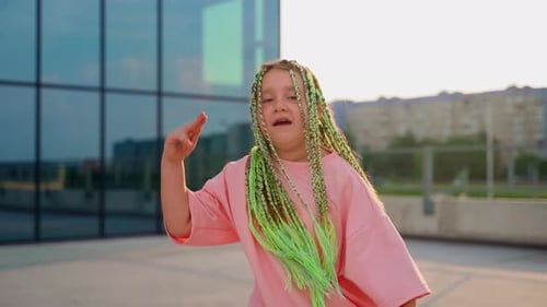 Girl dancing on sunset outdoors close up. Young female dancer person express emotions through body