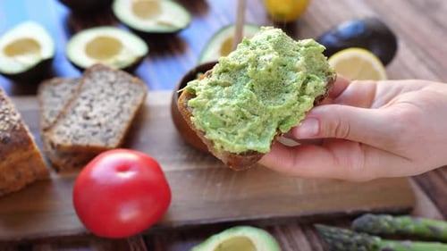 Avocado Toast Preparation with Fresh Ingredients