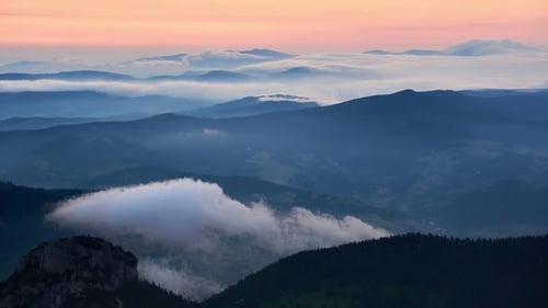 Fog in the Mountain Landscame in Morning
