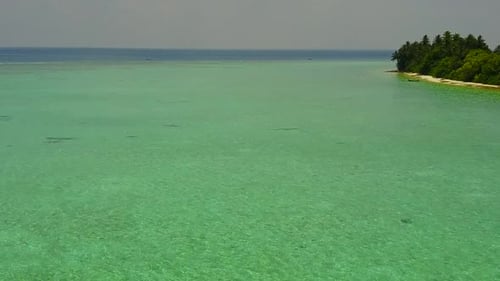 Aerial drone panorama of tropical shore beach by sea with sand background
