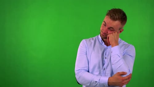 Young Handsome Business Man Is Bored - Green Screen - Studio