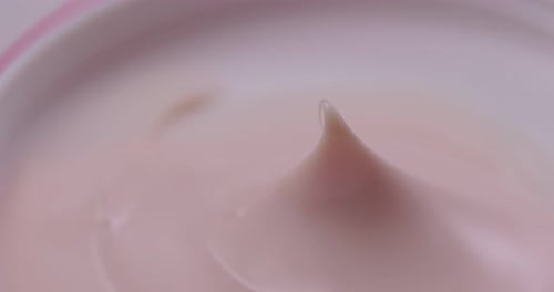 Close-Up of Pale Pink Cosmetic Face Cream