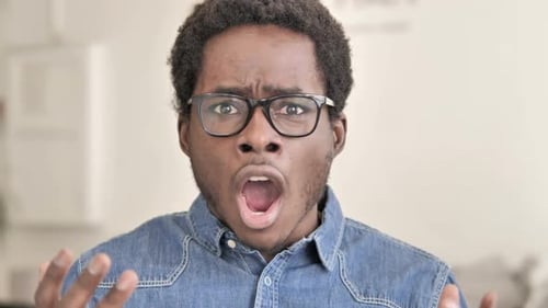 Close Up of Man Shouting at Camera