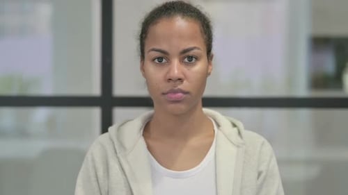 Portrait of Serious African Woman Looking at the Camera