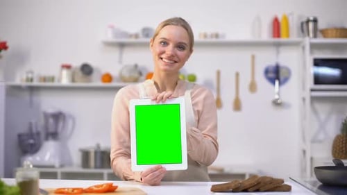 Beautiful Girl Holding Tablet With Green Screen, Easy Cooking Mobile Application