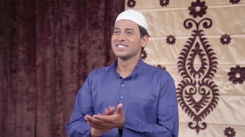 Muslim man clapping