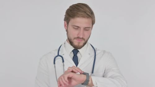 Young Doctor Using Smartwatch on White Background