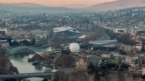 Beautyful cityscape of capital of Georgia. Time lapse shot of Tbilisi city at sunset.