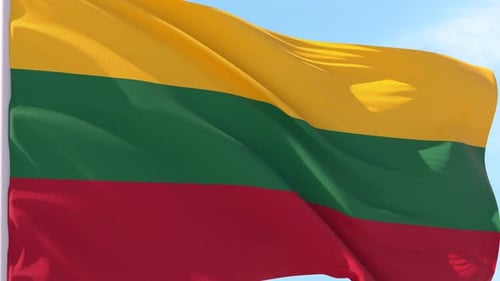 Waving Flag of Lithuania Against a Clear Blue Sky