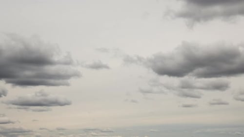 Grey Gray Cloudy Sky With Clouds. Natural Background. Sky Before Rain