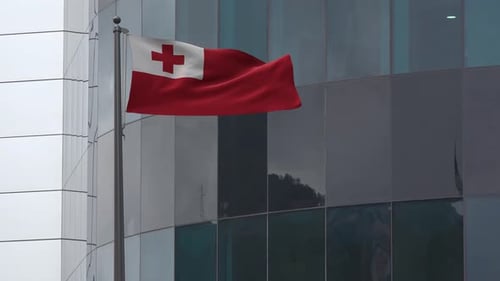 Tonga Flag Waving on Modern Building