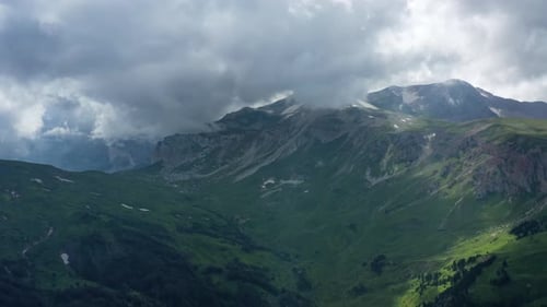 Aerial View of Green Mountains and Blue Sky