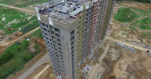 An Aerial View of an Almost Finished Multi Storey Building on the Construction Site