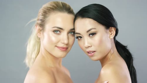 Young Blonde and Brunette Model in Studio