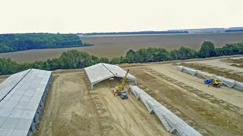 Constructing new farm. Aerial view of farm under construction for livestock