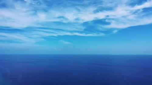 Aerial top down panorama of beautiful lagoon beach break by blue green ocean with white sand backgro