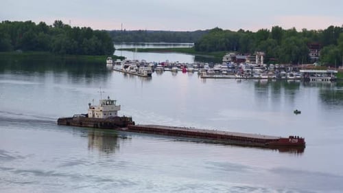 Tug Boat Pushing Barge at Mooring View Drone Shot