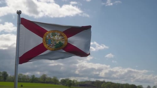 Florida State Flag Waving with Blue Sky