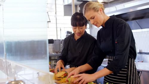 Chefs Preparing Food in a Commercial Kitchen