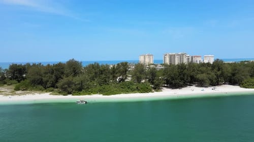 Camera is moving sideways across a secluded beach at a park in Florida. As the camera continues the