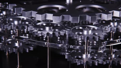 Intricate Metal Gears Turning in Precise Mechanism
