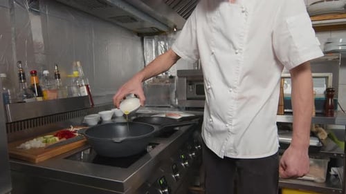 Chef Preparing Food in Commercial Kitchen