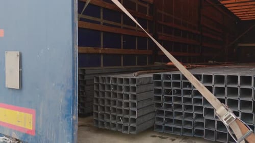 Unloading Metal Tubing from Delivery Truck