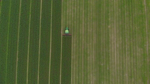 Tractor Tilling Farm Field Aerial View