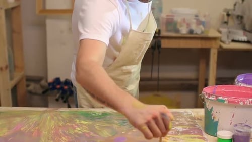 Dedicated Artist Creates Abstract Painting in Studio