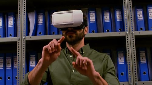 Man Using VR Headset in Filing Room