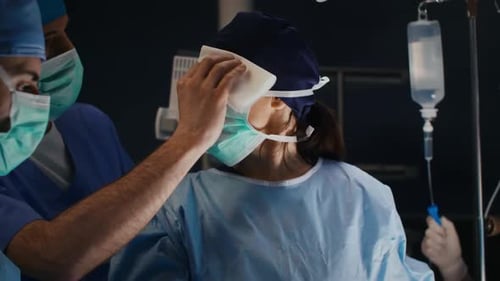 Medical Team Performs Surgery in Bright Operating Room