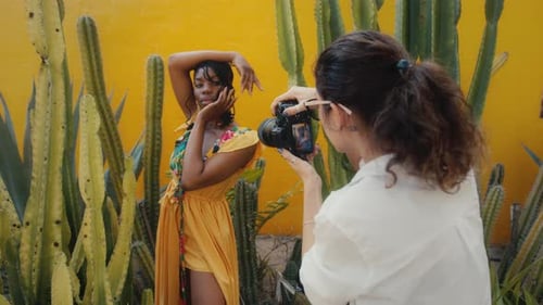 Fashion Model Posing in Front of Cacti