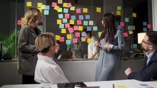 Professionals Brainstorming Ideas in a Modern Office