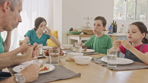 Multi Generational Family Enjoying a Meal Together