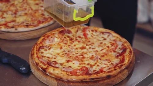 Process of making pizza. Close up of fresh original pizza preparation
